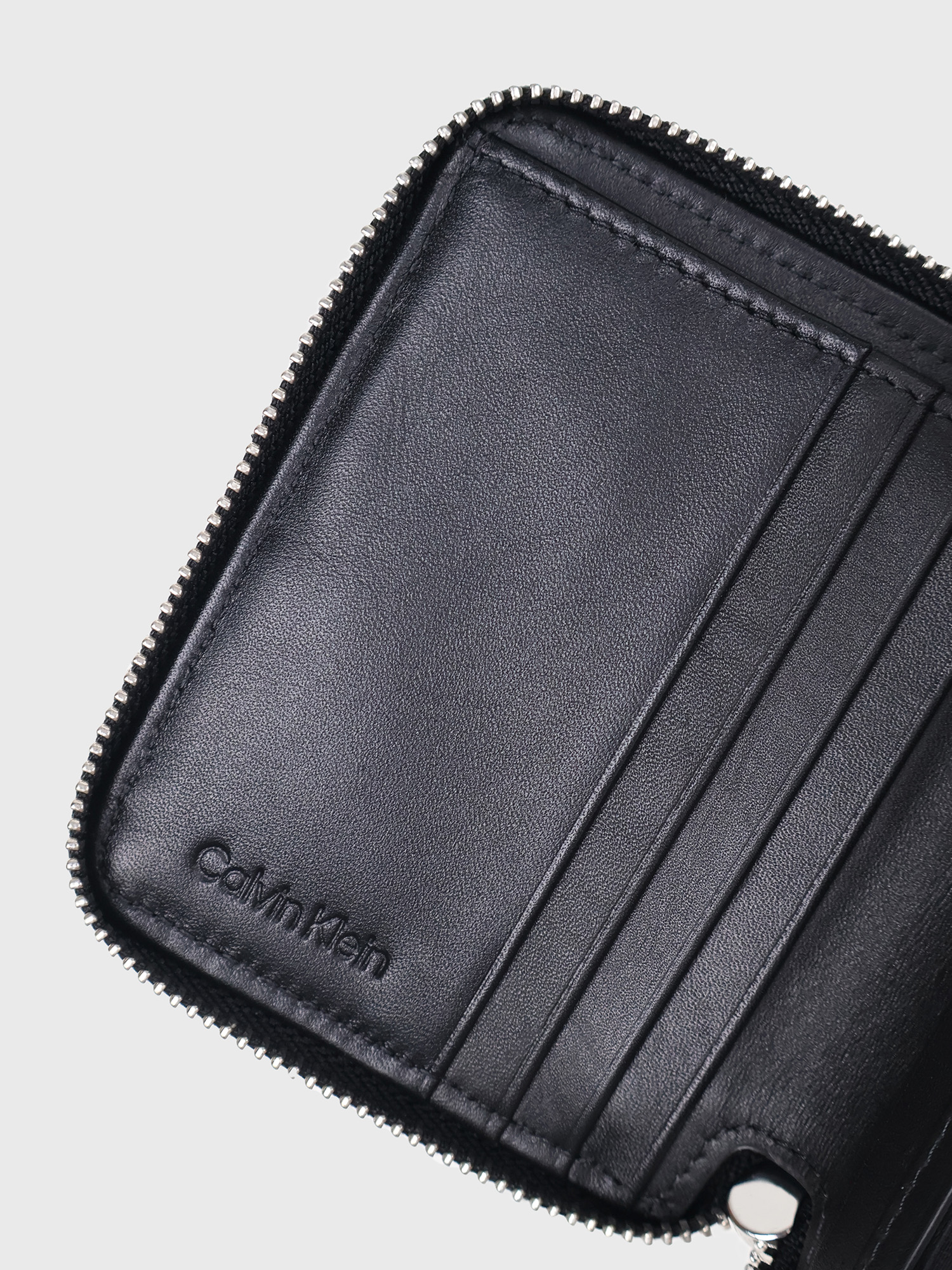 Кошелек Calvin Klein Embossed Allover Emblem Logo Zip Wallet Black